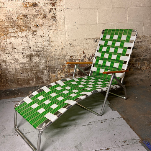 Green and white patio lounge chair