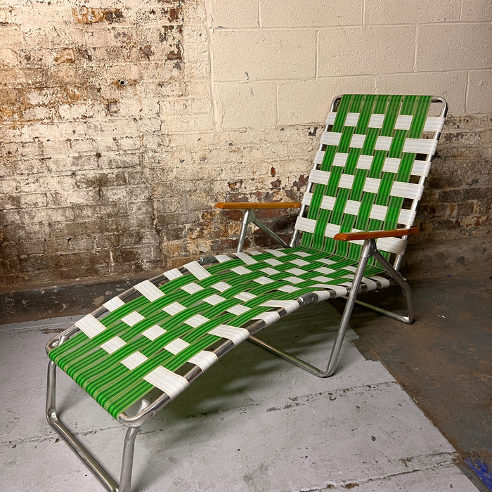 Green and white patio lounge chair
