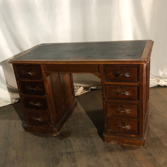 Brown vintage desk with green top