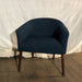 Blue Fabric Chair with modern wooden legs.  