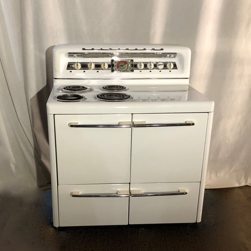 Vintage white oven with burners and cook space from 1950's