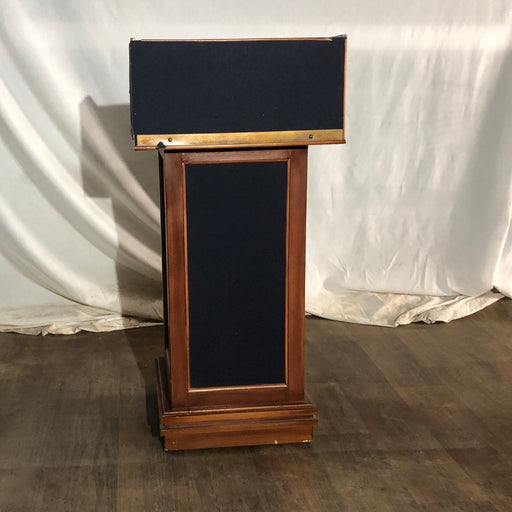 Blue Fabric and Wooden Podium