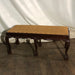 Orange/Tan Padded Bench with Six Carved Cabriole Legs.