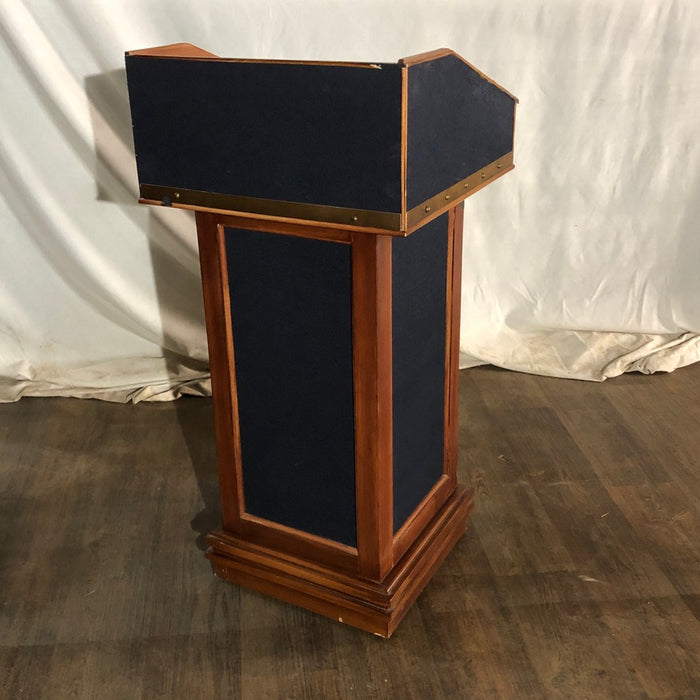 Blue Fabric and Wooden Podium