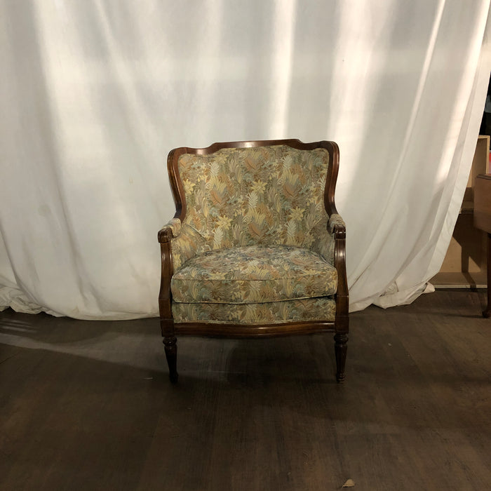 Upholstered Armchair with wooden accents