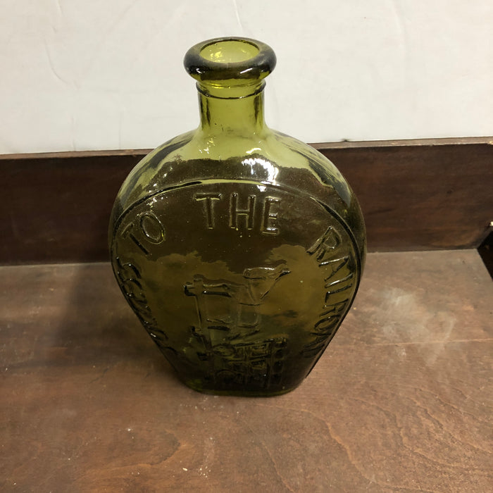 Green Glass Liquor Bottle with Decorative Design