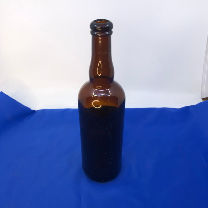Tall Brown Glass Liquor Bottle