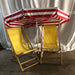 Two Yellow Beach Chairs with Umbrella