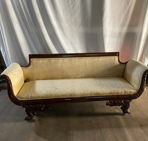 unique carved pale yellow couch
