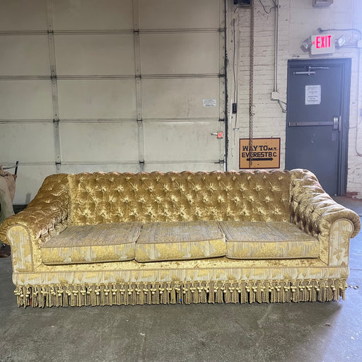 Yellow button couch
