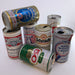 vintage opened beer cans